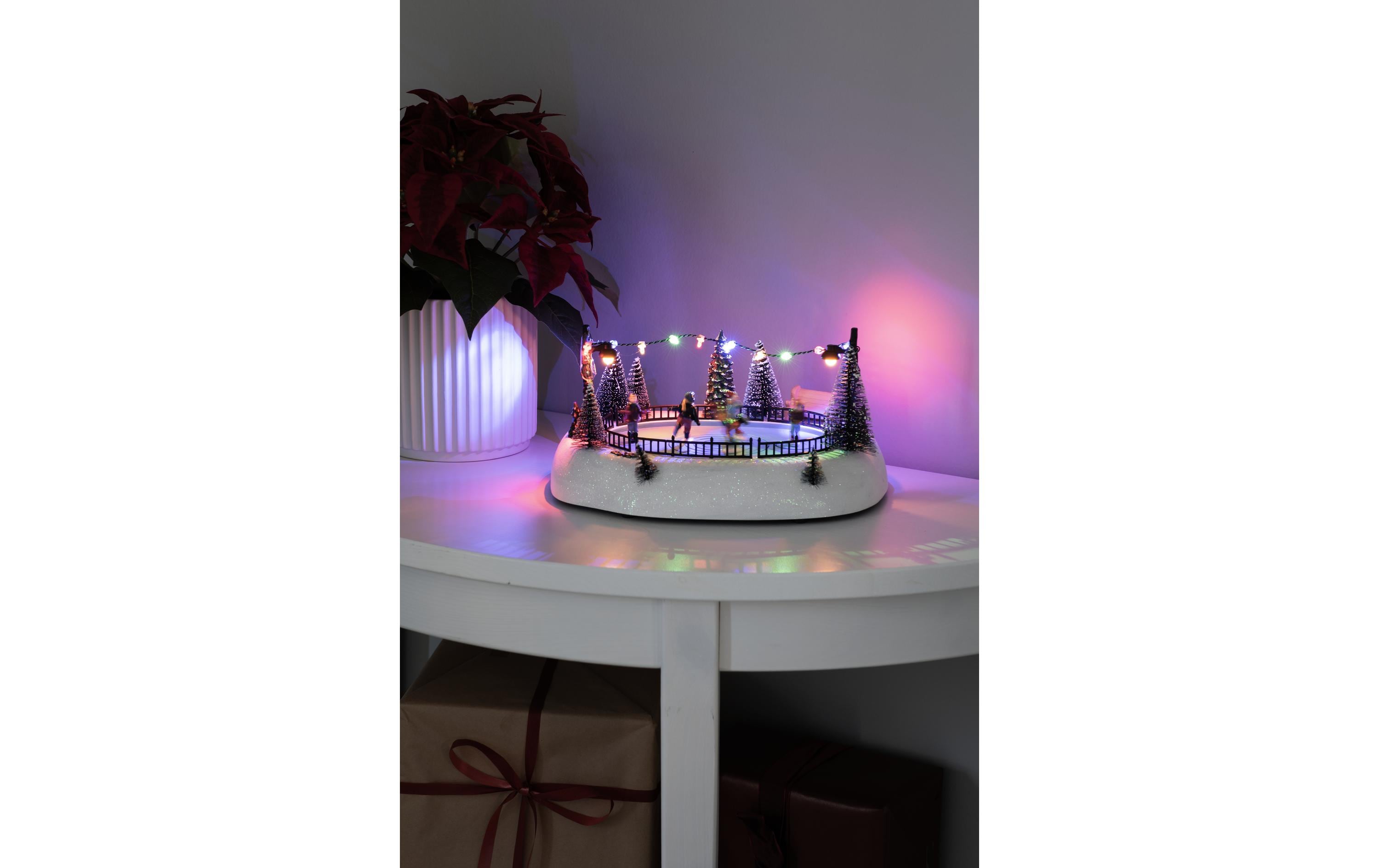 Konstsmide LED-Figur Szenerie Eisbahn mit Musik, 12 Dioden, Mehrfarbig